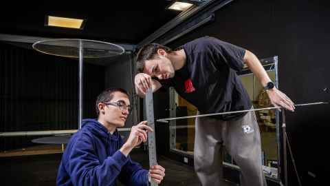 Students testing an airfoil in the University's wind tunnel