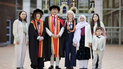 Maqsood Rezayee on graduation day with his supervisors and family. Photo: Chris Loufte