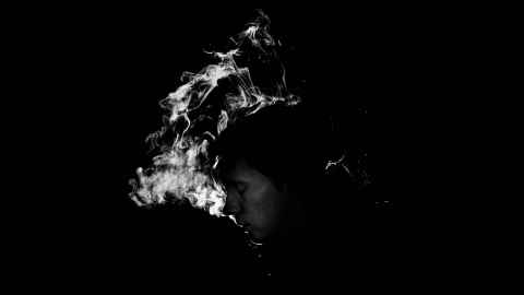 Smoke against a black background.