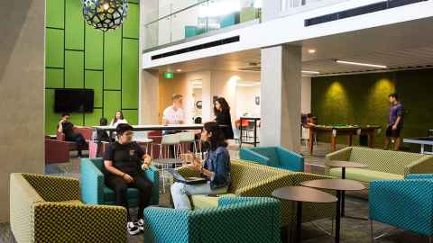 Students hanging out in the communal room.