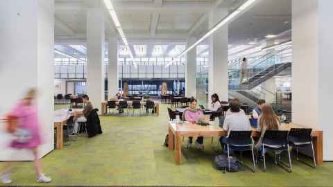 People walking near the entrance of the General Library