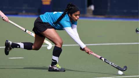 student-playing-hockey