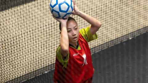 Student playing Interfaculty Netball
