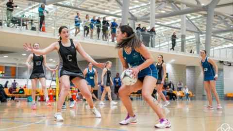 students playing tertiary netball