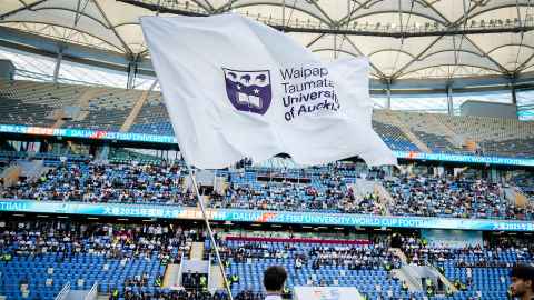 Image of UoA flag at welcome ceremony
