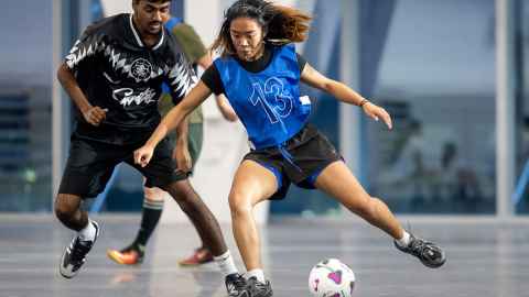 students playing futsal