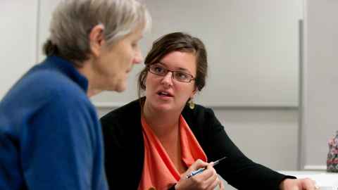 A speech-language therapist works with a client.