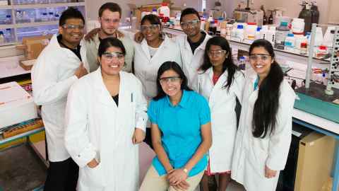 Chemical Sciences lecturer and students in a lab