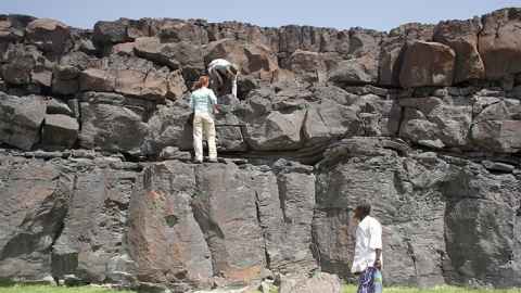 Researchers looking at volcanic stratigraphy in Afar, Ethiopia
