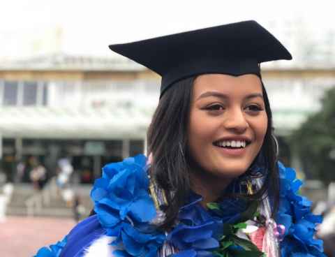 Melanie Mayall-Nahi in graduation regalia