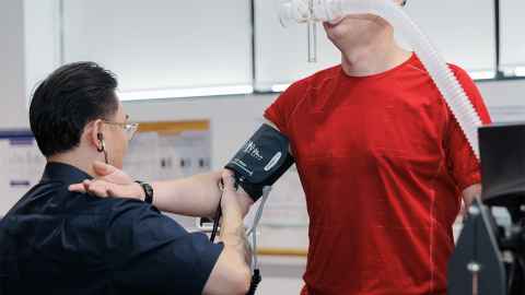 Researcher conducting experiment at the research centre