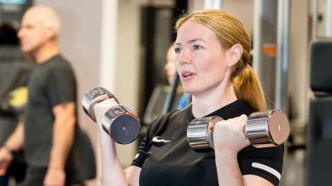 Woman working out at rehab clinic