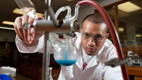 Portrait of science graduate Joseph Peni