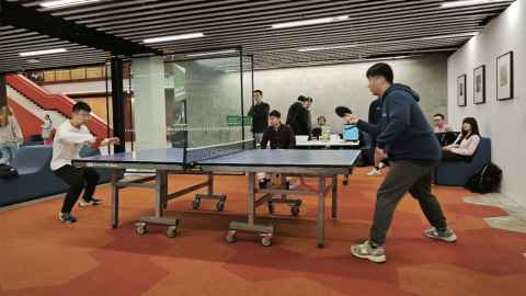 Science transnational education playing ping pong