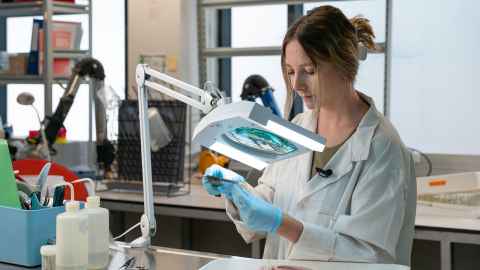 A picture of student Georgia Third in a laboratory. 