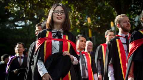 Graduands wearing academic regalia