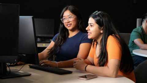 Students at a computer.
