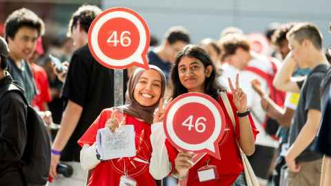 Two UniGuides posing for a photo at Orientation.