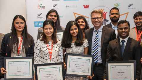 NZEA scholarship winners and Minister of Education Paul Goldsmith