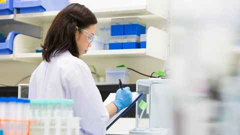 Chemistry student working in a laboratory.
