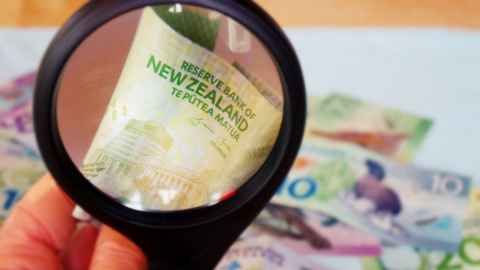 A $20 note, through a magnifying glass.