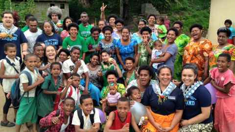 A large group of people in the Pacific islands.