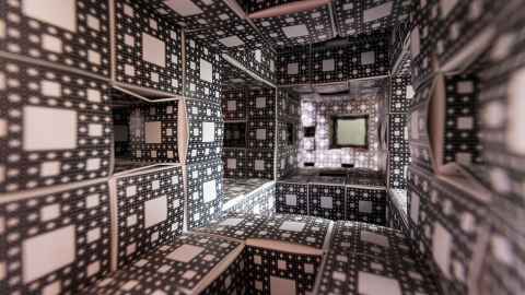 The inside of a structure made of cubes, with a geometric design.
