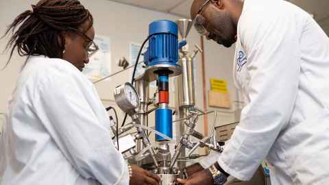 Two workers in a laboratory