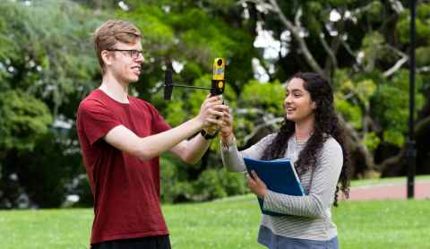Two Science students in an outdoors setting