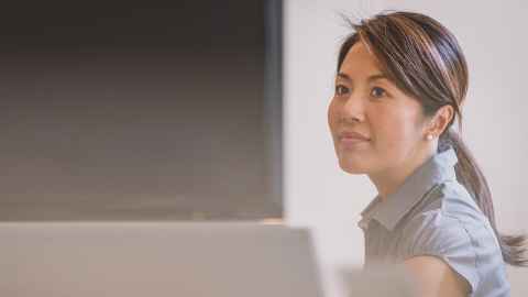 Woman sitting at a desk