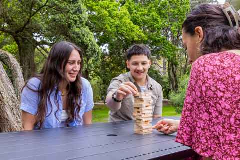 Tōia ki Waipapa students playing a game by Old Government House