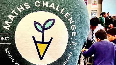 Maths Challenge logo on the back of someone's t-shirt