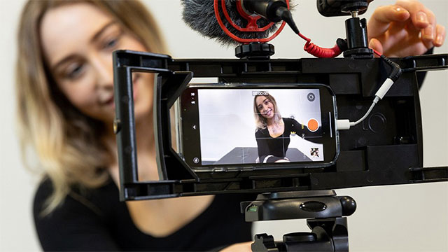 Person holding a camera