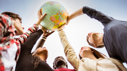 Hands holding a globe