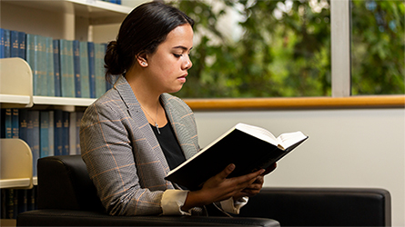 Student reading a book