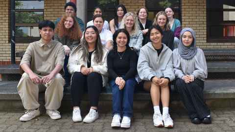 image of wellbeing equity student ambassadors sitting in a group